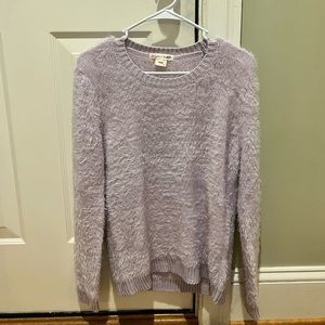 Rag doll and rockets light purple sweater. Great condition. Youth XL